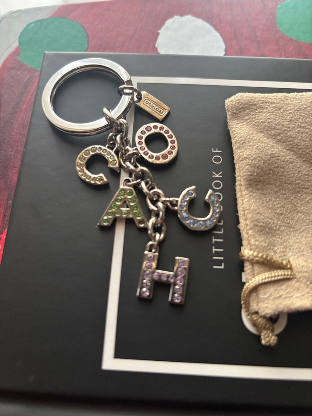 Coach bejeweled letters Silver key chain